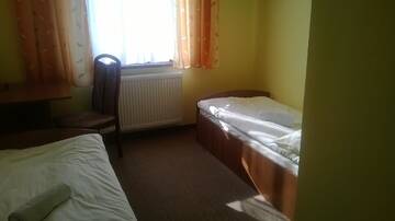 Фото номера Двухместный номер с 2 отдельными кроватями Хостелы Hostel Miłosz г. Grabowiec 7